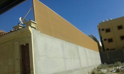  ساتر حماية من الشمس والمطر للمنازل